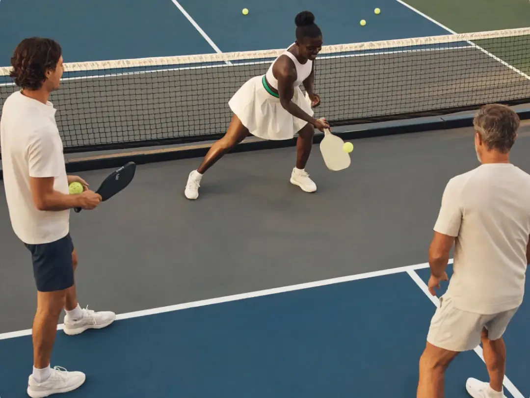 Players at an indoor pickleball venue